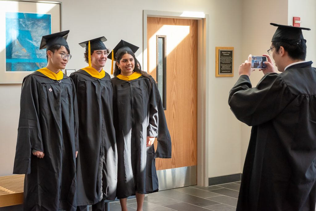 FinMath students posing for photos post commencement