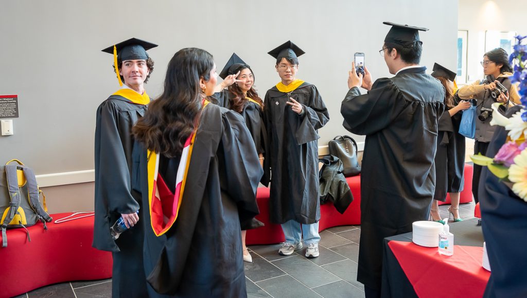 FinMath students posing for photos post commencement