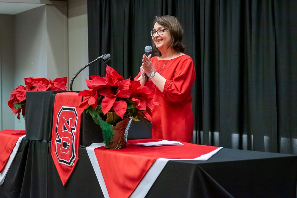 Department Head, Dr. Chertock, giving the Math Department Fall 2024 Commencement Welcome Address