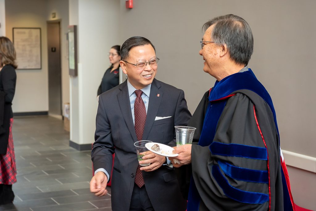 Dr. Pang and faculty post commencement